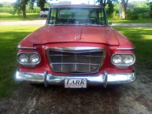 Photograph of our 1962 Studebaker Lark after it hit the front of our motor-home.